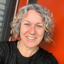 ITAV staff member smiling